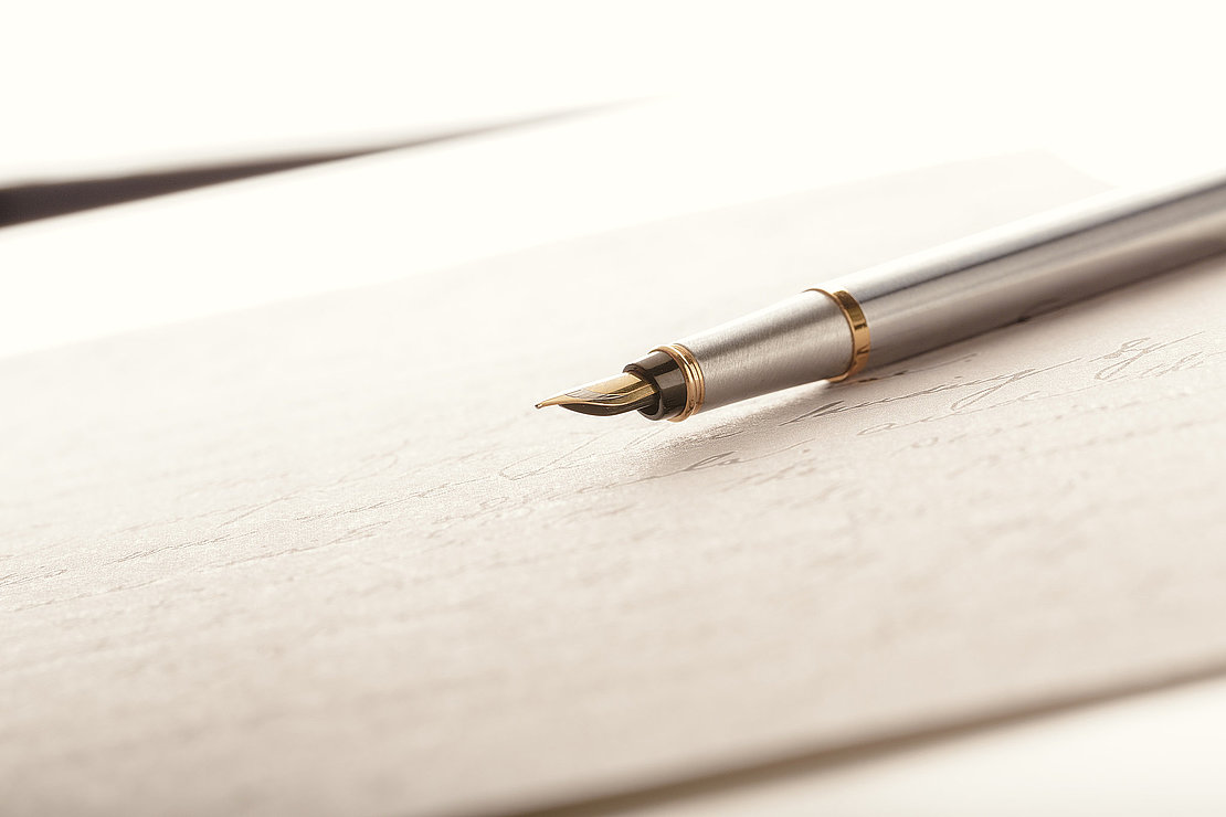 Fountain Pen on Written Page