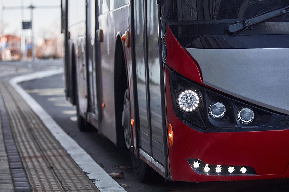 Public transportation bus in urban surroundings.