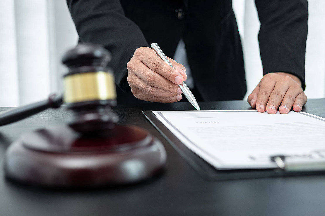 Female lawyer working with legal case document contract in office, law and justice, attorney, lawsuit concept