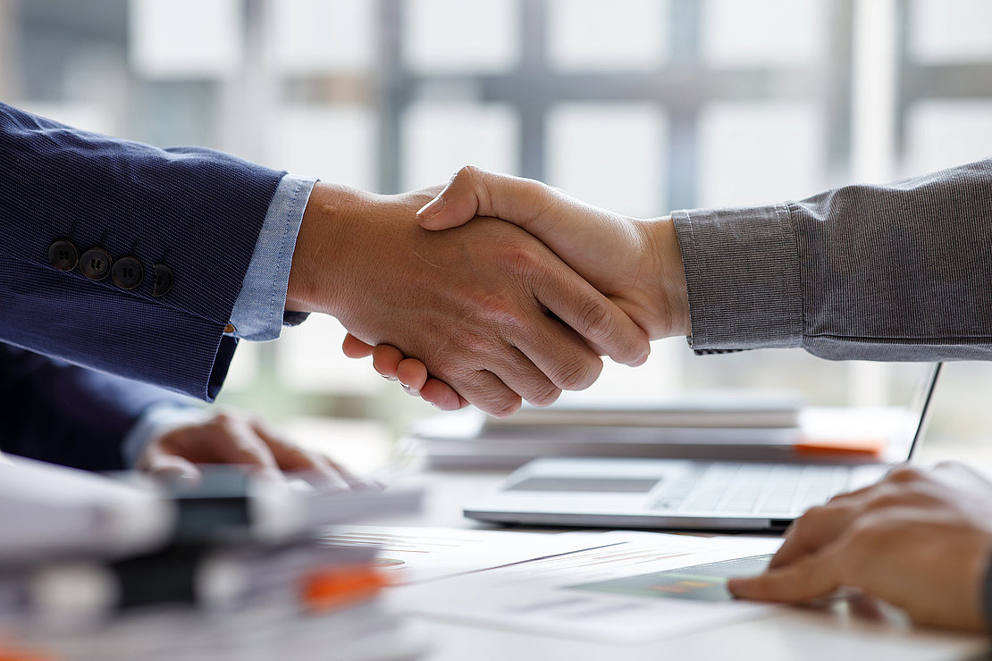Financial Business handshake for teamwork of business merger and