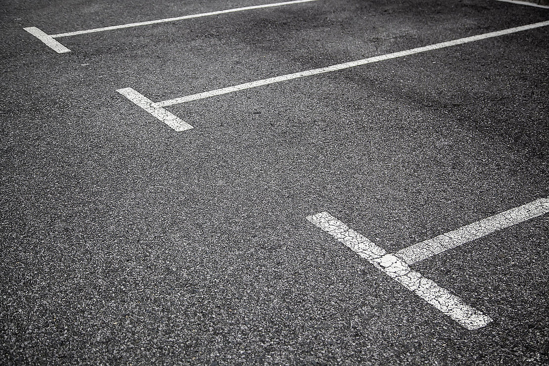 Parking signs on the asphalt