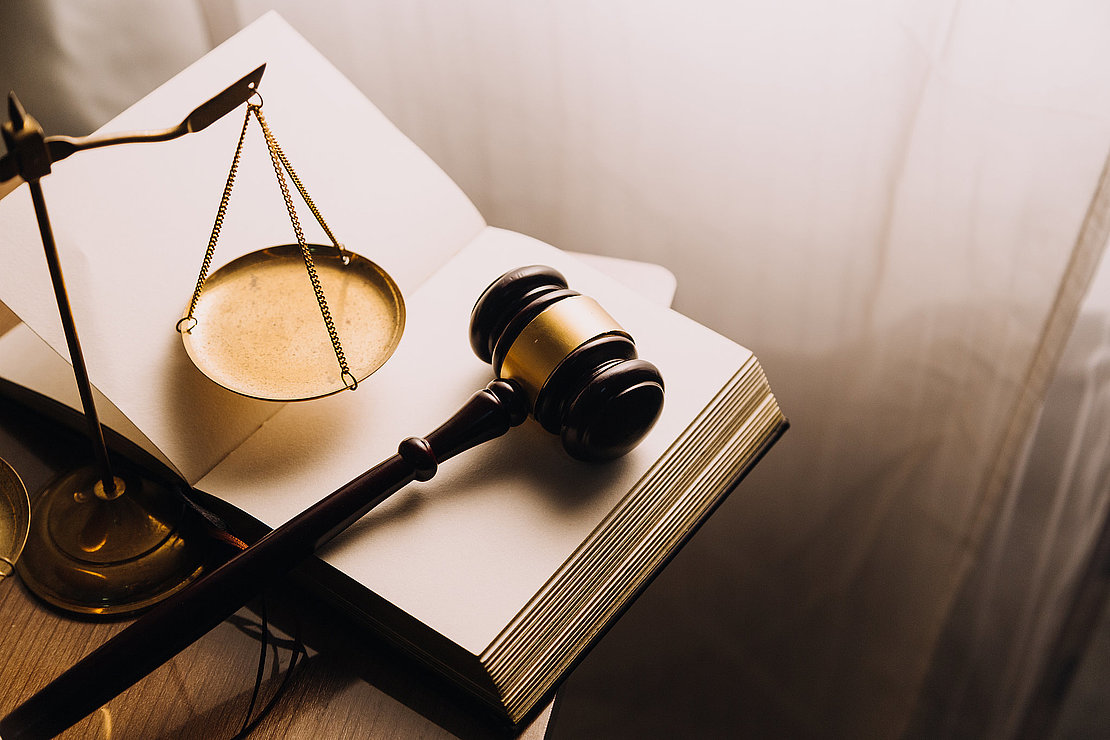 Justice and law concept.Male judge in a courtroom with the gavel