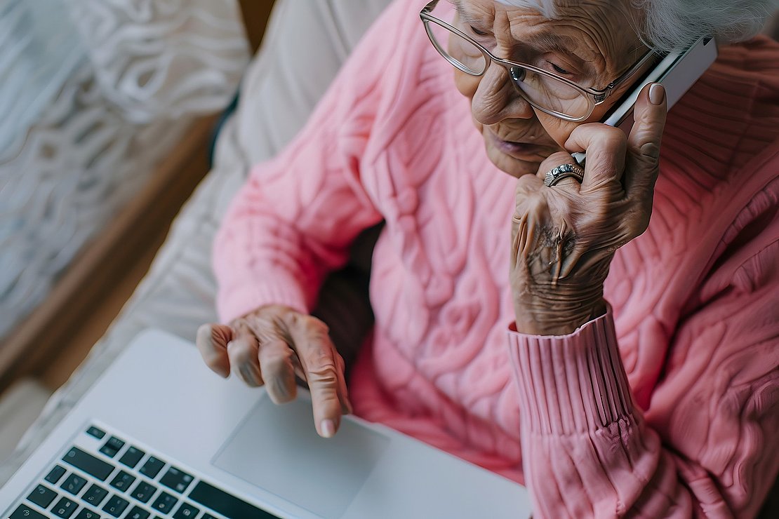 an elderly person with a laptop, technology and seniors, scam, isolation, vulnerable